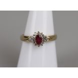 Gold ruby and diamond cluster ring - Size N