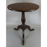 Tilt top oak pedestal table