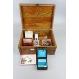 Small wooden chest and contents to include watches and jewellery