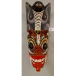 Oriental carved and painted wall mask