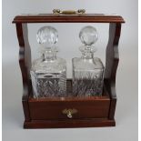 Tantalus with two cut glass decanters