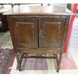 Antique oak music cabinet with barely twist legs
