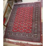 Red patterned rug - Approx L: 196cm W: 143cm