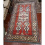 Iranian red patterned rug - Approx L: 220cm W: 125cm