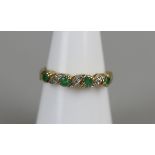 Gold emerald and diamond set ring size N
