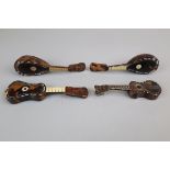 4 miniature string instruments made with tortoise shell and mother of pearl