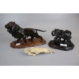 Two bronze animal figures together with resin figure