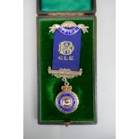 A good George V silver and blue enamel masonic pendant, in original black Morocco gilt lined case.