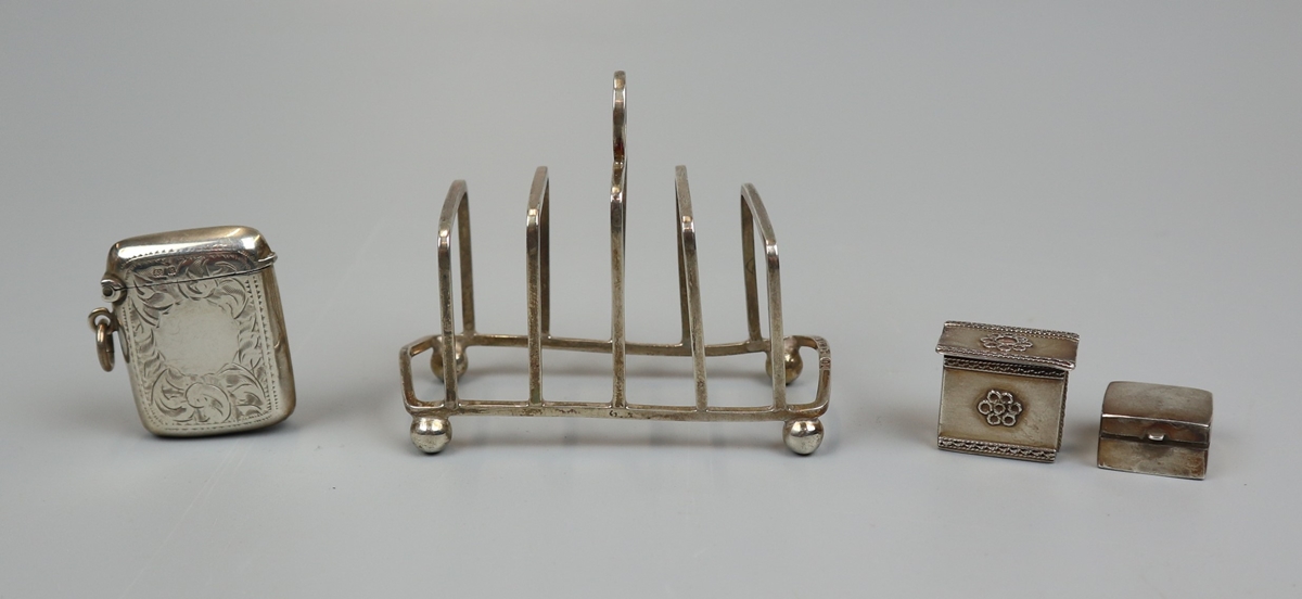 Collection of hallmarked silver items to include toast rack and vesta case - Approx weight 81g