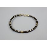 Gold and elephant hair bangle