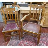 Set of 8 antique oak key-hole dining chairs to include 2 carvers on casters