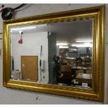 Bevelled glass mirror in gilt frame