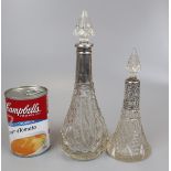 A matched pair of Edwardian silver and finely cut glass cylindrical tapered scent bottles, with cone