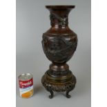 Large bronze vase on carved wooded base - Approx H: 42cm