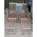 Pair of teak steamer chairs with cushions