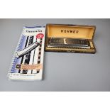 Hohner harmonica together with a teach your self to play book