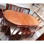 Oriental themed extending table and 8 chairs to include 2 carvers - Approx table size L: 215cm W: