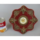 Desk time piece by British United Clock Co Birmingham in red velvet and gilt metal shell decorated