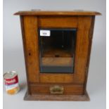 Antique oak pipe cabinet with key