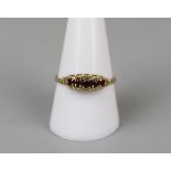 Gold garnet set ring - Size S