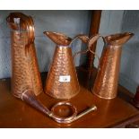 3 hand beaten copper jugs together with hunting horn