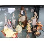 Collection of lady figurines to include Nao, LLadro, Royal Doulton etc