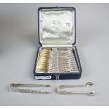 Cased French silver plate spoons along with 2 hallmarked silver sugar tongs