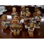 A collection of Goebel figurines with musical theme after sister Marie Hummel's drawings. All are