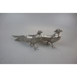 Pair of white metal pheasants