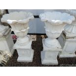 Pair of stone planters on plinths - Height 90cm