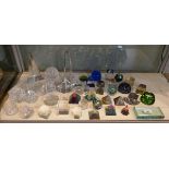 Collection of glass paperweights to include Waterford crystal