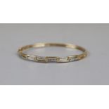 Gold and diamond set bangle