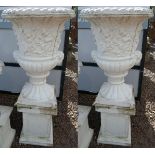 Pair of stone planters on plinths - Height 128cm