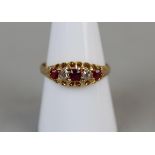 18ct gold ruby and diamond ring - Size Q