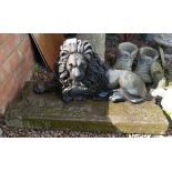 Cast iron lion on stone base