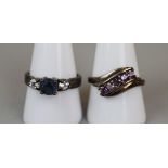 2 silver stone set rings