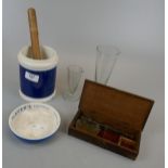 Scales, measuring jars, thermometer and ashtray.