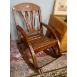 Antique scratch built rocking chair made from an old cartwheel