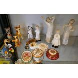 Collection of figurines to include Lladro and Disney characters