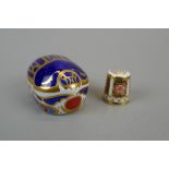 Royal Crown Derby paperweight with gold stopper together with thimble