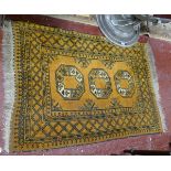 Gold patterned Afghan rug