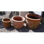3 graduated terracotta planters