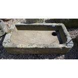 Large antique stone trough