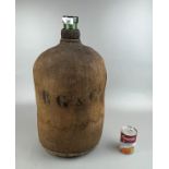 Hessian padded and bound large ships storage bottle with branded shipping Co details and lead