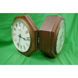 Double sided station clock