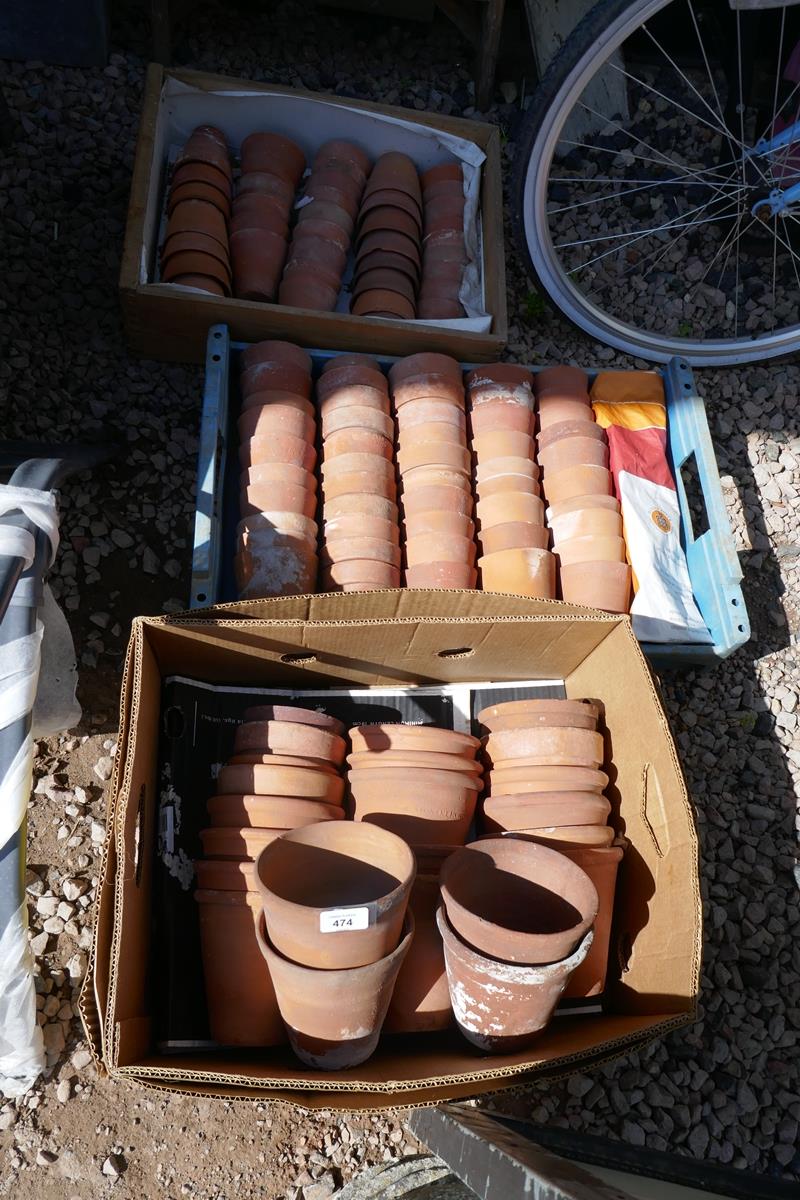 Large collection of terracotta plant pots