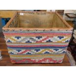 Am unusual Kelim covered leather trimmed rectangular box with red, blue, green and yellow motifs and