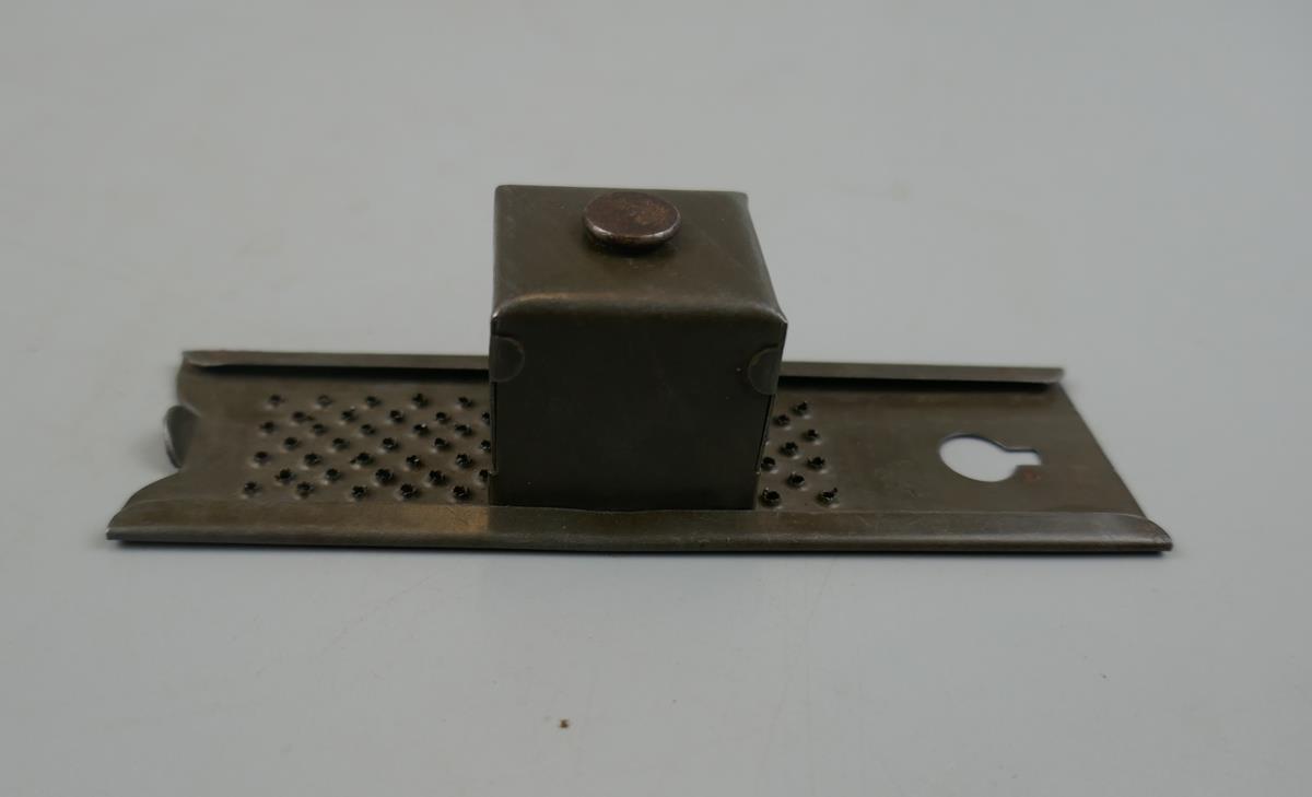 An unusual 19th Century pocket nutmeg grater with spring loaded nutmeg holder/slide