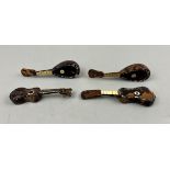 4 miniature tortoise-shell & mother of pearl musical instruments