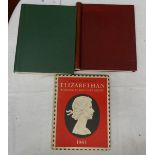 2 well populated stamp albums together with a reference book